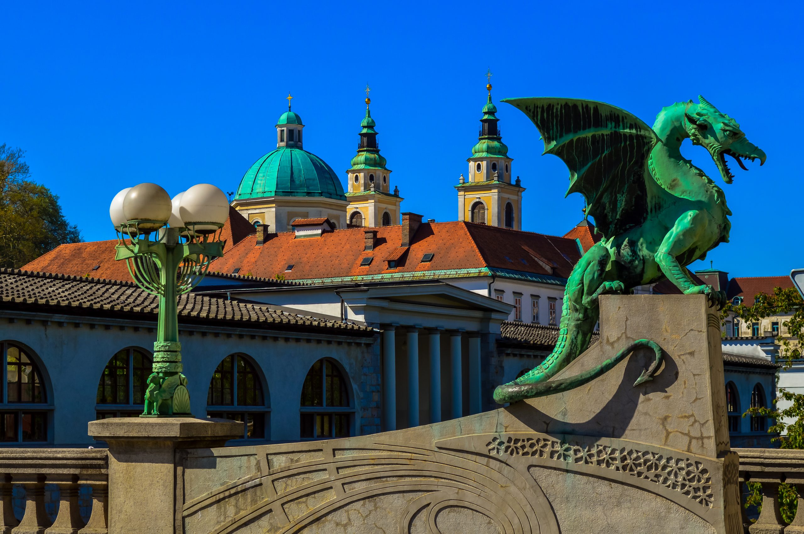 Visit The Famous Dragon Bridgeduring The Ljubljana And Bled Lake Highlights Tour From Zagreb