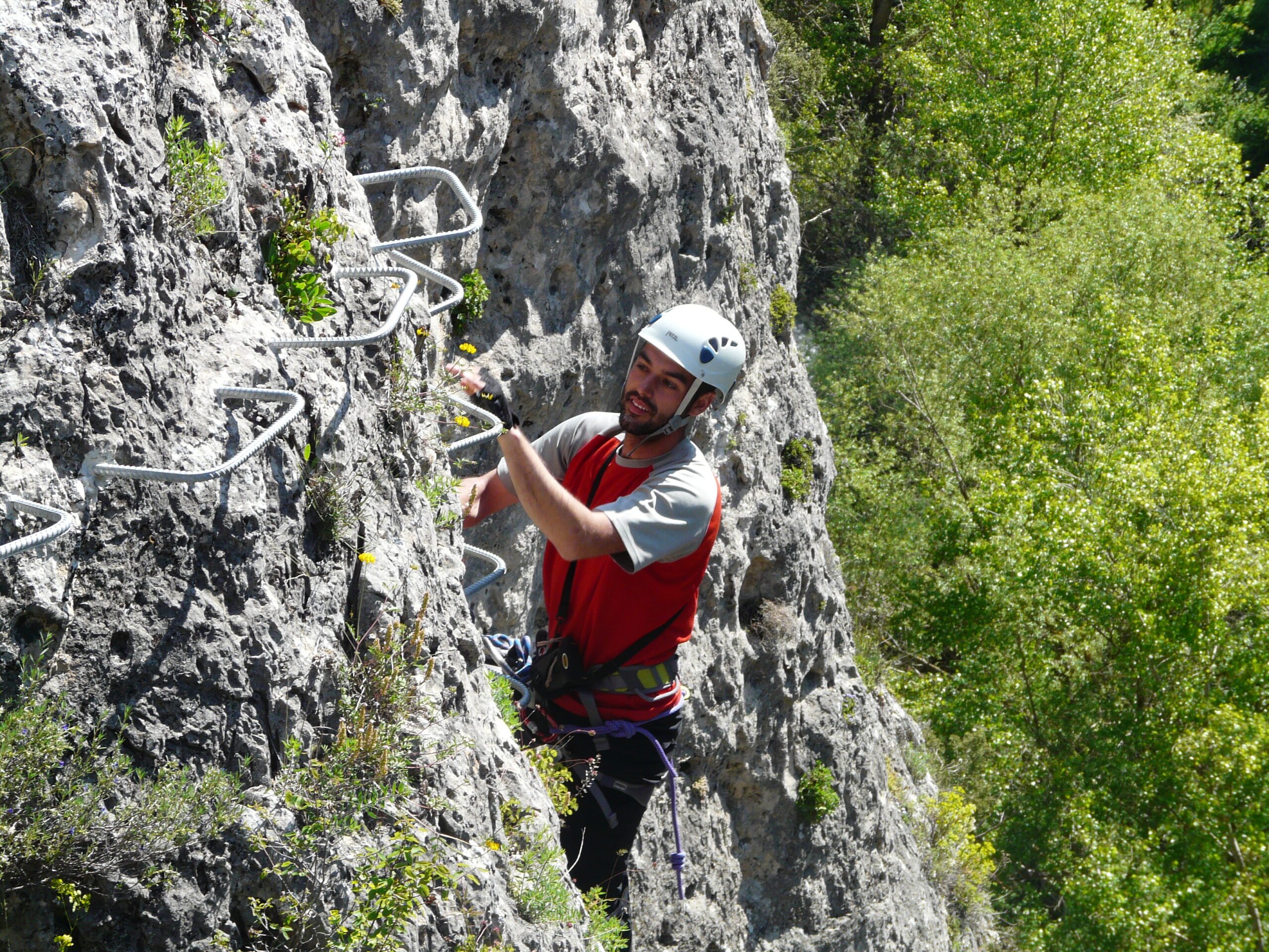 A Vertical Climb And Traverse Along The Limestone Walls Of The Hoz De Priego, In Our Via Ferrata Adventure Tour In Cuenca