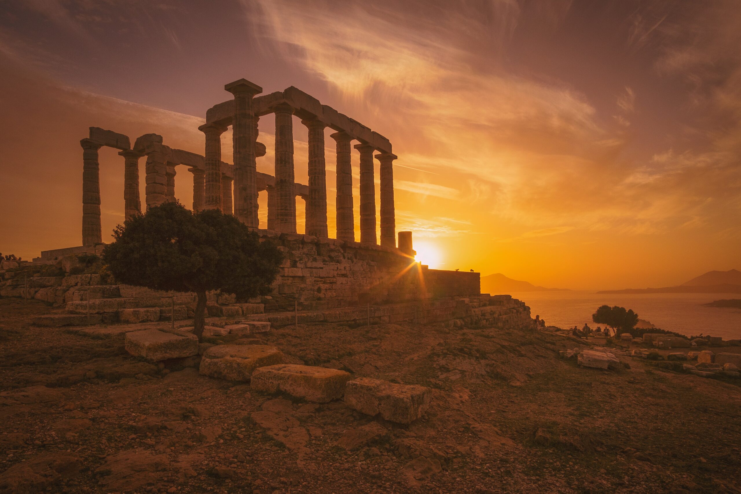 See The Sun Set Over The Temple Of Poseidon On Our 10 Day Athens, Santorini & Mykonos Package Tour